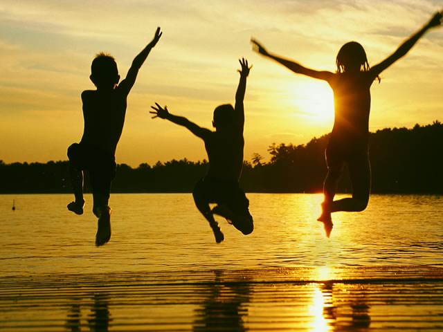 Spring Into Summer with a Lake Home Vacation You'll Love by Cedar Creek Lake Getaways 1 kids jumping off of dock CedarCreekLake.Online